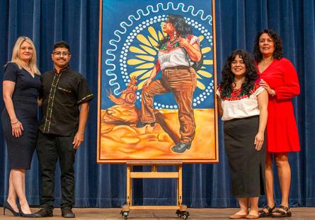 Phoenix College President Dr. Kimberly Britt, artist Edgar Fernandez, PC alumna Elida Acosta, and Laura Pastor, PC Community Relations, posing with the painting at the PC Fall 2024 Convocation.
